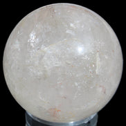 Clear Quartz sphere 70mm 475g in sunlight - Rocks and Things Store