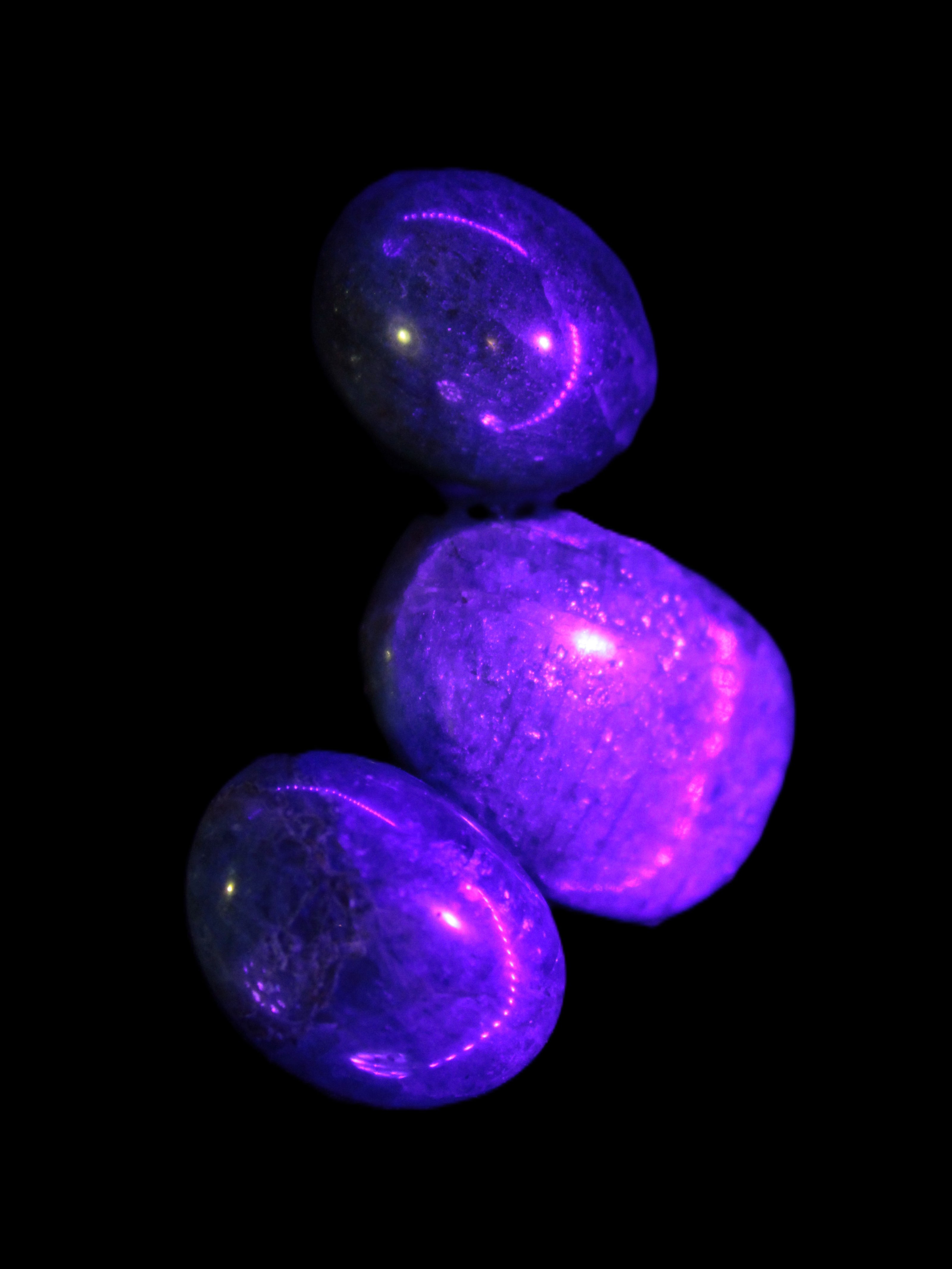 Three Blue Apatite polished stones 20-22g in UV light