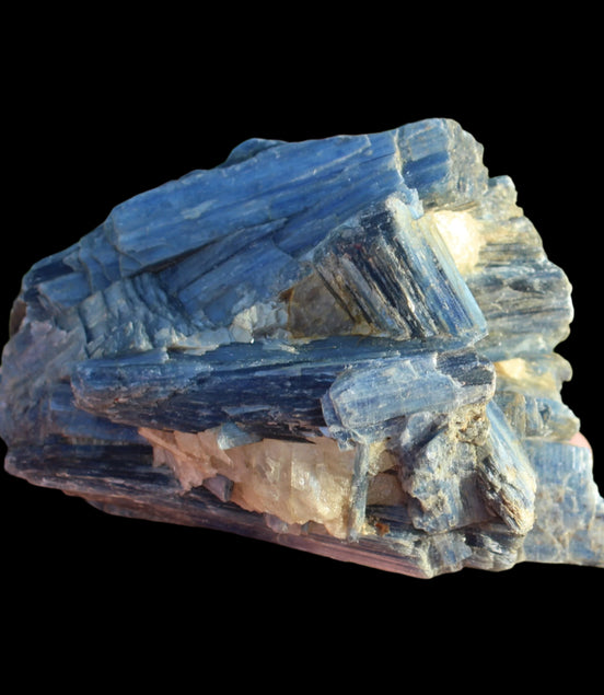Kyanite cluster with stand 573g in su nlight - Rocks and Things Store
