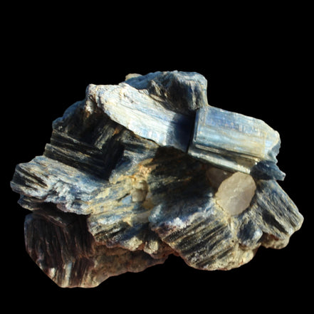 Kyanite cluster with stand 573g in su nlight - Rocks and Things Store