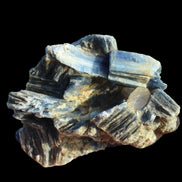Kyanite cluster with stand 573g in su nlight - Rocks and Things Store