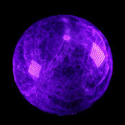Chevron Fantasy Amethyst sphere 1424g in UV light - Rocks and Things Store