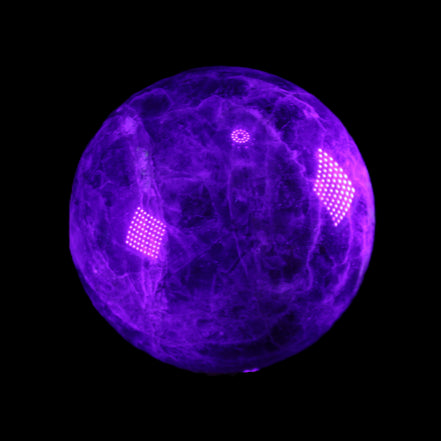 Chevron Fantasy Amethyst sphere 1424g in UV light - Rocks and Things Store