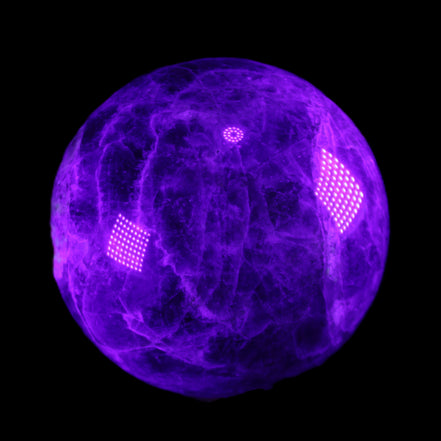 Chevron Fantasy Amethyst sphere 1424g in UV light - Rocks and Things Store