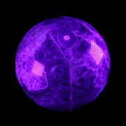 Chevron Fantasy Amethyst sphere 1424g in UV light - Rocks and Things Store