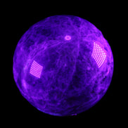 Chevron Fantasy Amethyst sphere 1424g in UV light - Rocks and Things Store