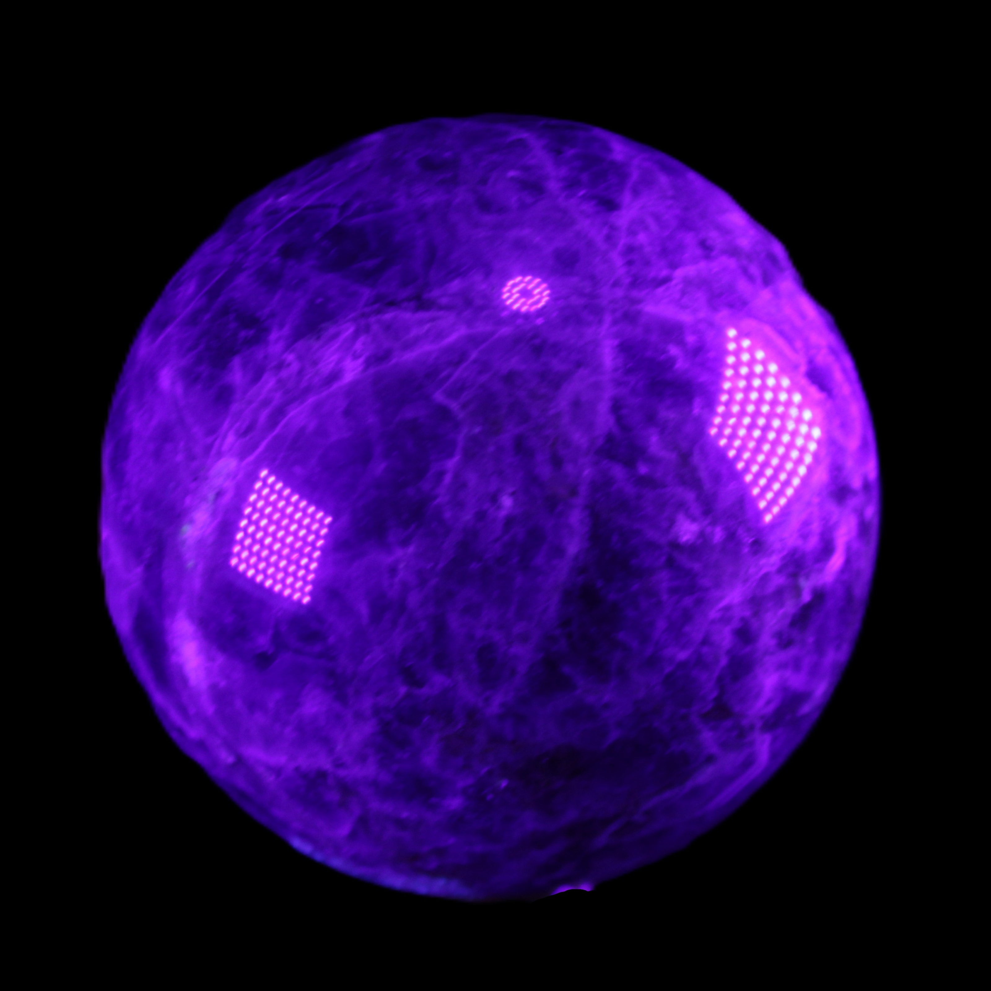 Chevron Fantasy Amethyst sphere 1424g in UV light - Rocks and Things Store