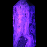 Hemimorphite Sky Blue wand 60mm 56.5g in UV light - Rocks and Things Store