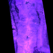 Hemimorphite Sky Blue wand 60mm 56.5g in UV light - Rocks and Things Store