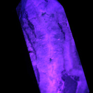 Hemimorphite Sky Blue wand 60mm 56.5g in UV light - Rocks and Things Store