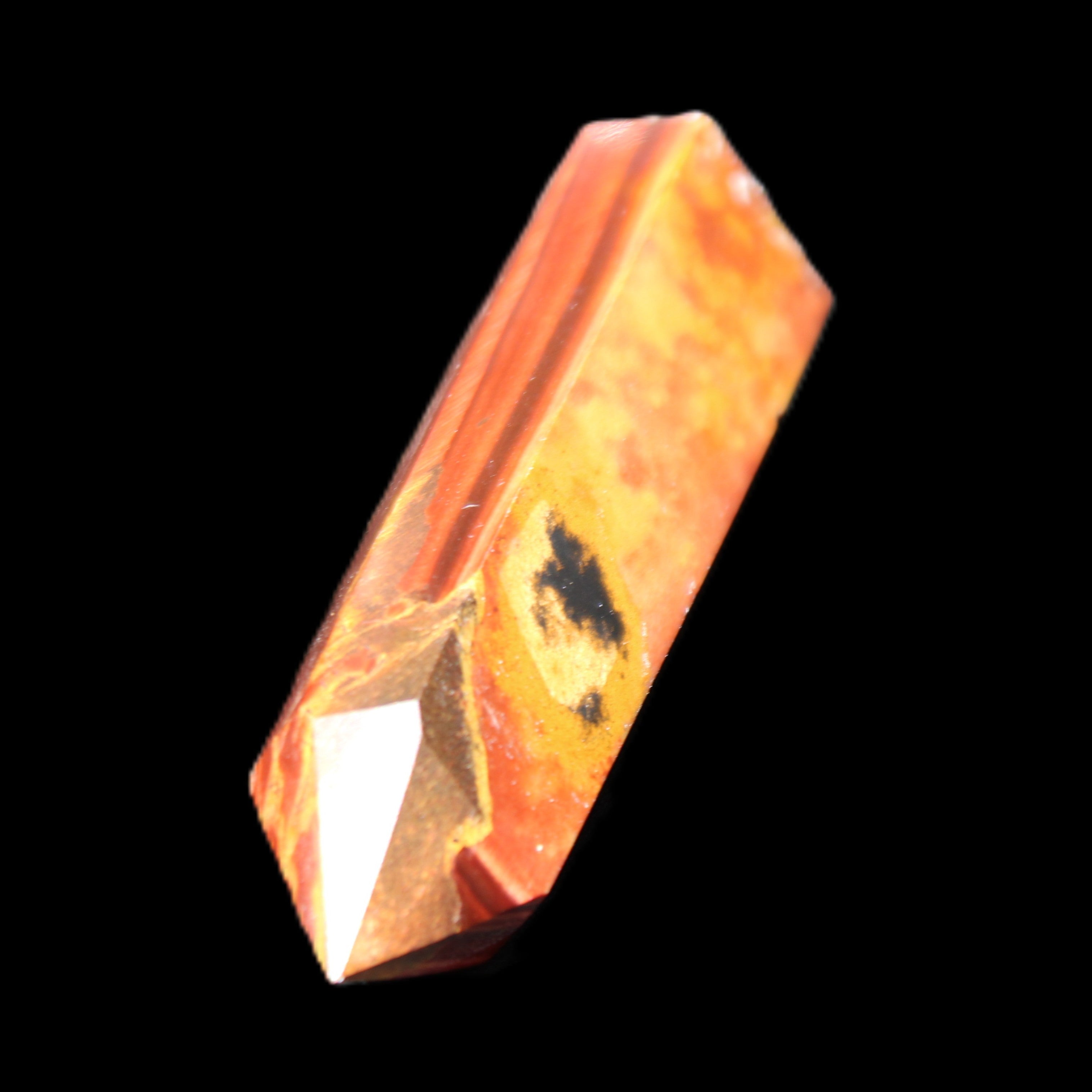 Red Tigers Eye wand 57mm 45.6g in sunlight - Rocks and Things Store