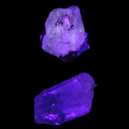 Two Fenster crystals 14.9g in UV light