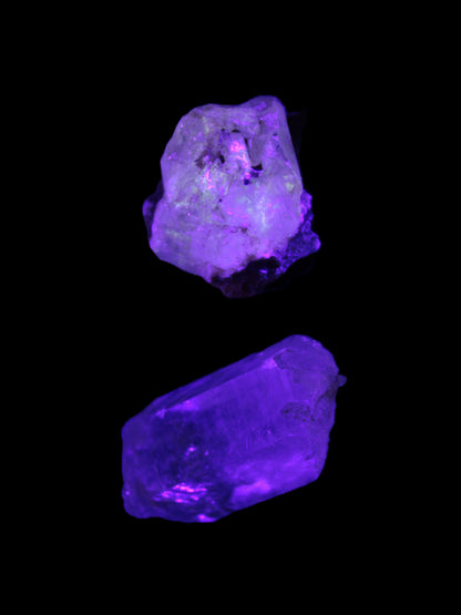 Two Fenster crystals 14.9g in UV light