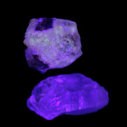Two Fenster crystals 14.9g in UV light