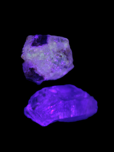 Two Fenster crystals 14.9g in UV light