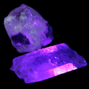 Two Fenster crystals 14.9g in UV light