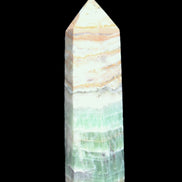 Caribbean Calcite Pellucid wand 83mm 83g in sunlight - Rocks and Things Store