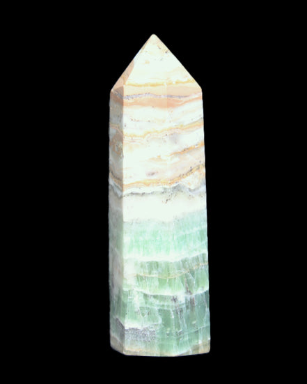 Caribbean Calcite Pellucid wand 83mm 83g in sunlight - Rocks and Things Store