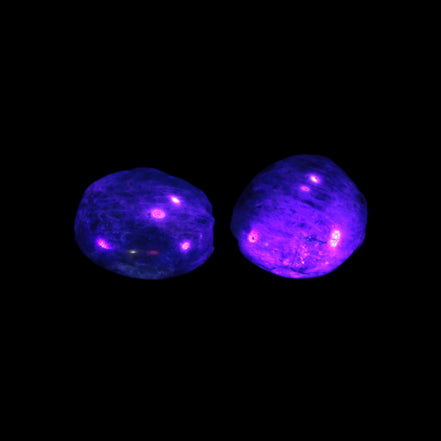 Neon Blue Apatite 2 tumbled stones 17-20mm 14g in UV light - Rocks and Things Store