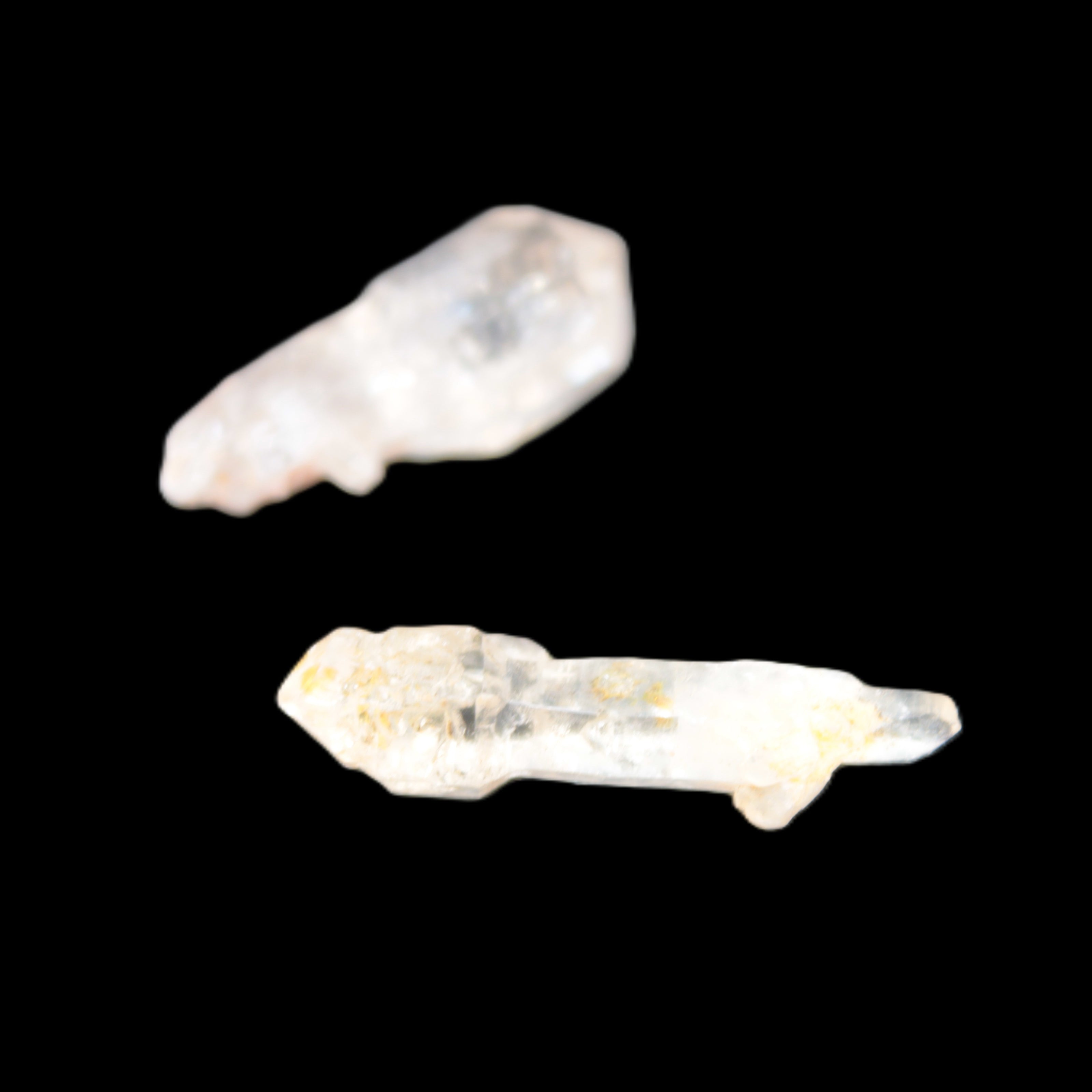 Two Fenster sceptre crystals with bridges, enhydro & hydrocarbons 5.3g in bright sunlight