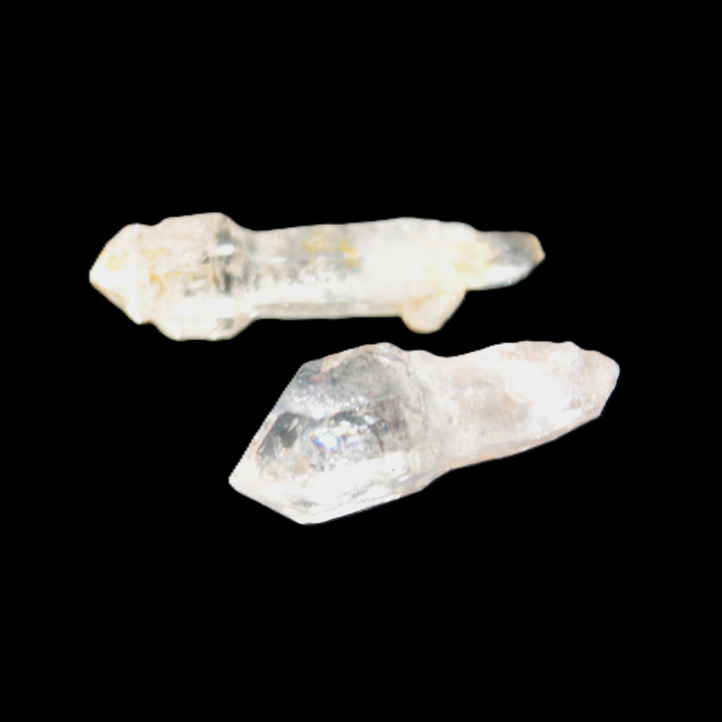 Two sceptre crystals with bridges, enhydro & hydrocarbons 5.3g in bright sunlight