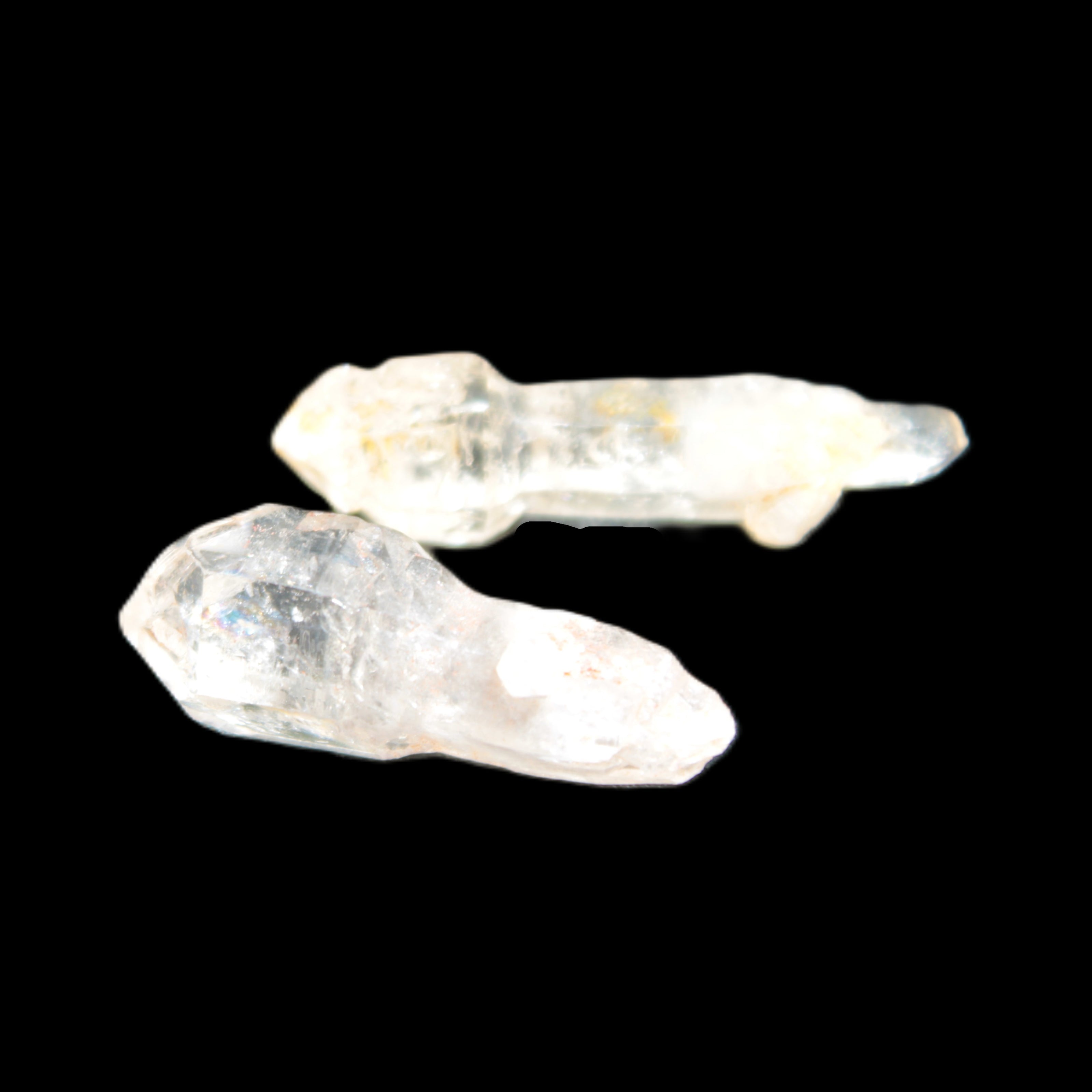 Two Fenster sceptre crystals with bridges, enhydro & hydrocarbons 5.3g in bright sunlight