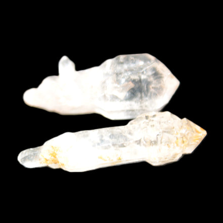 Two sceptre crystals with bridges, enhydro & hydrocarbons 5.3g in bright sunlight