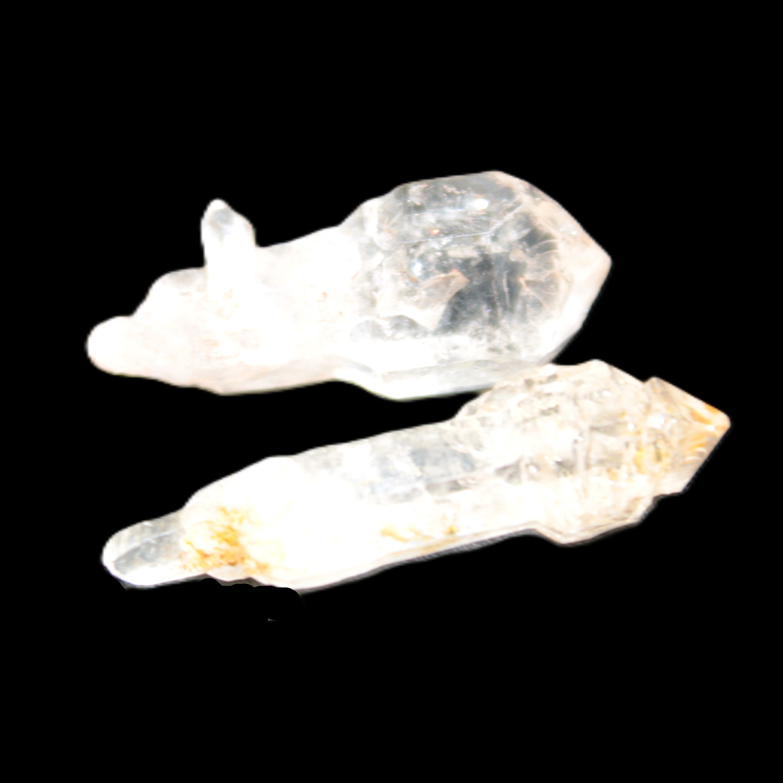 Two sceptre crystals with bridges, enhydro & hydrocarbons 5.3g in bright sunlight
