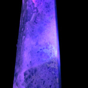 Green Fluorite obelisk 707g in UV light - Rocks and Things Store