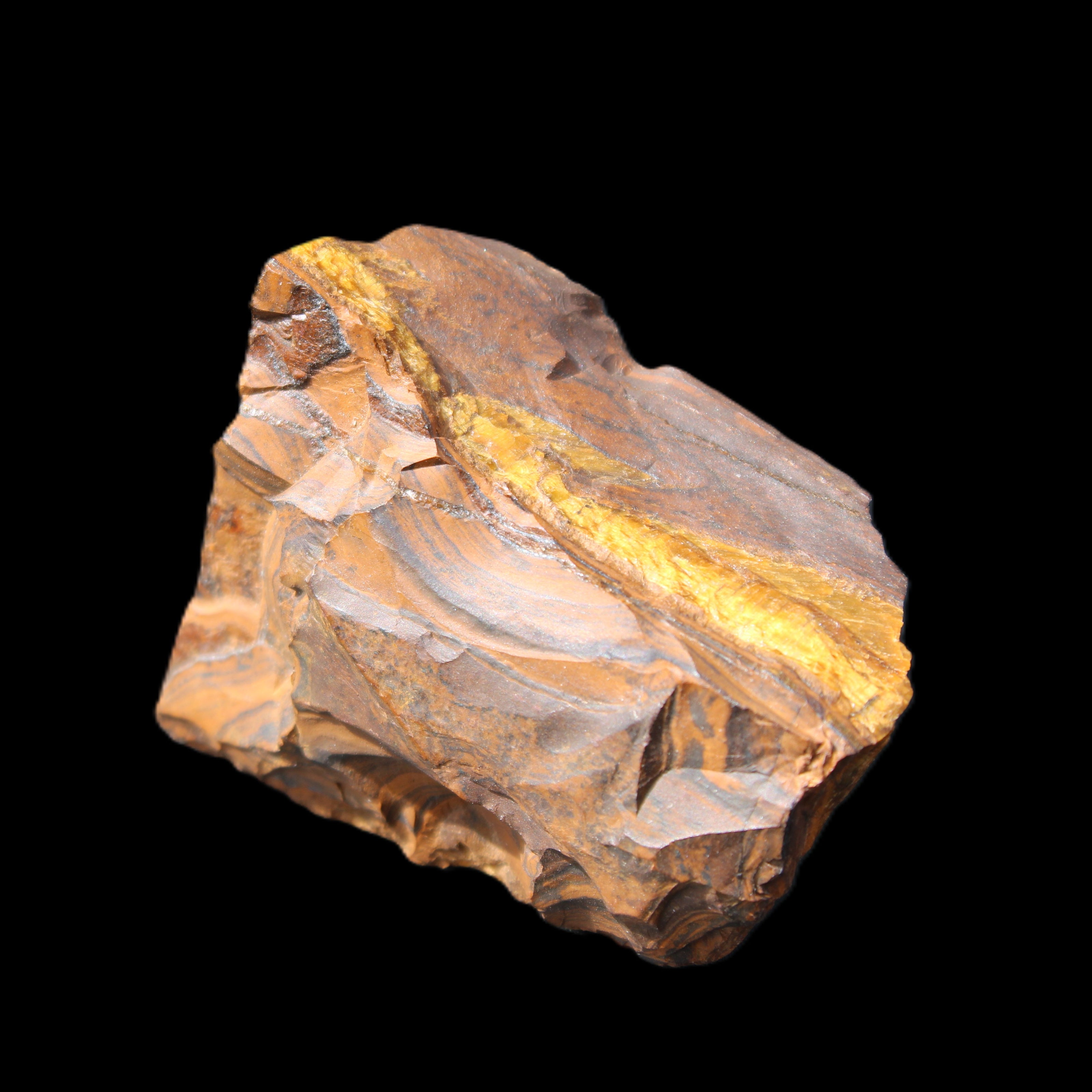 Golden Tigers Eye natural stone 100g in sunlight - Rocks and Things Store