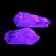Two Fenster skeletal Enhydro crystals with hydrocarbons 4.8-8.6g