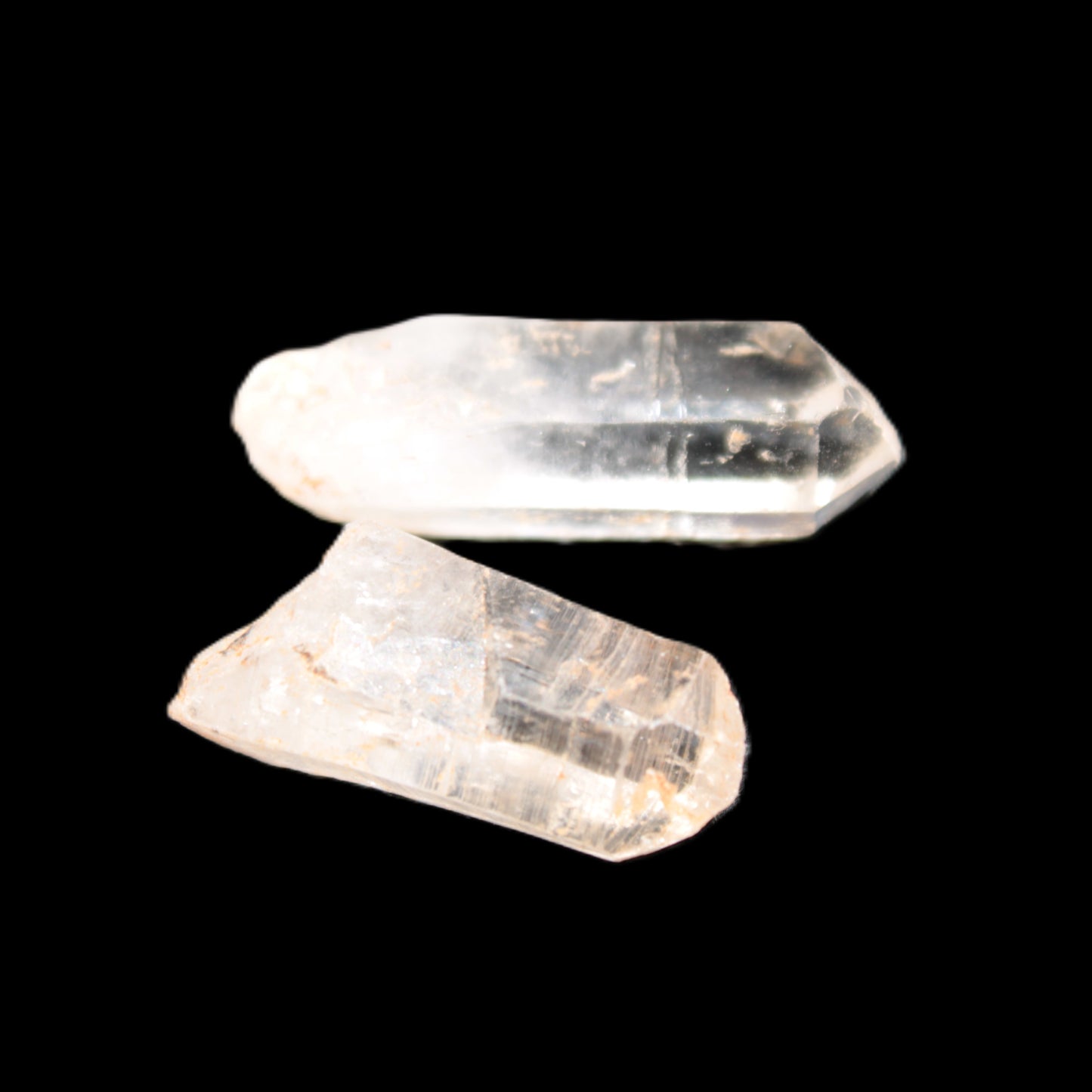 Two Fenster skeletal Enhydro crystals with hydrocarbons 4.8-8.6g