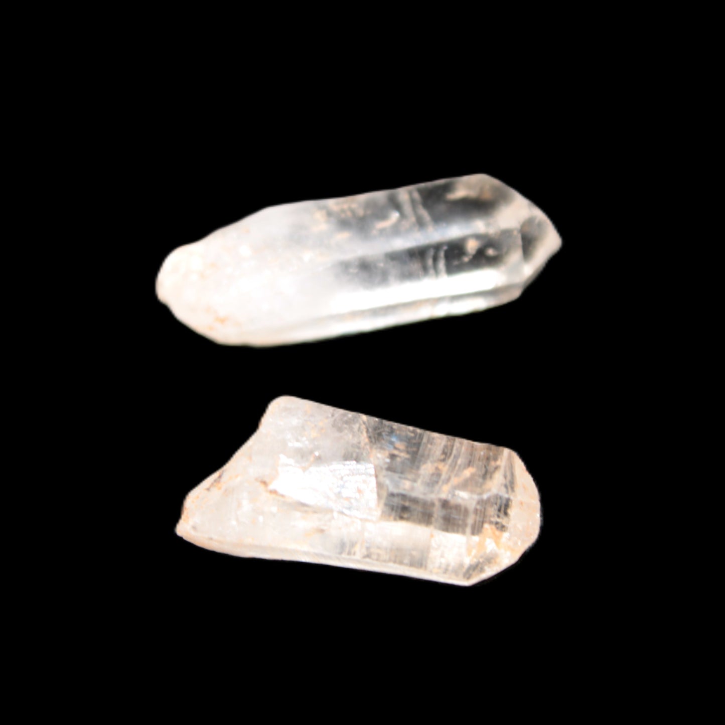 Two Fenster skeletal Enhydro crystals with hydrocarbons 4.8-8.6g