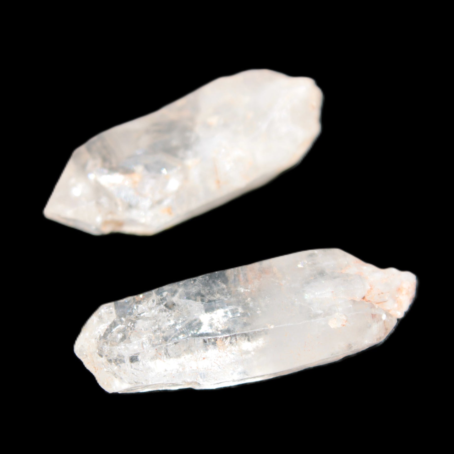 Two Fenster skeletal Enhydro crystals with hydrocarbons 4.8-8.6g