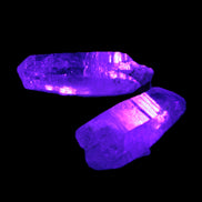 Two Fenster skeletal Enhydro crystals with hydrocarbons 4.8-8.6g