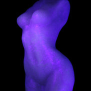 Pink Opal hand-carved woman's torso goddess 38*80mm 134.7g in UV light