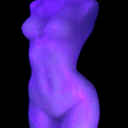 Pink Opal hand-carved woman's torso goddess 38*80mm 134.7g in UV light