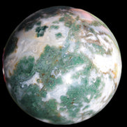 Ocean Moss Agate sphere 70mm 606g in sunlight