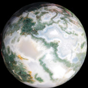 Ocean Moss Agate sphere 70mm 606g in sunlight