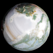 Ocean Moss Agate sphere 70mm 606g in sunlight