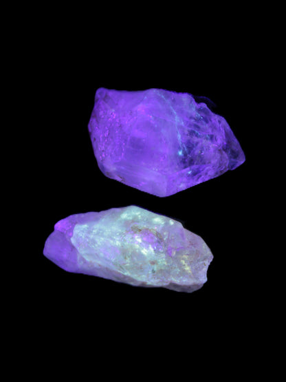 Two Fenster crystals 26mm 13.3g in UV light