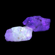 Two Fenster crystals 26mm 13.3g in UV light