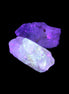 Two Fenster crystals 26mm 13.3g in UV light