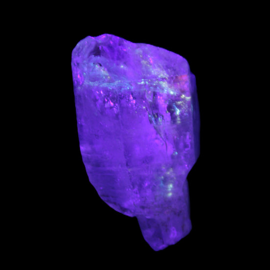 Fenster Crystal with hydrocarbons 34mm 11.6g in UV light