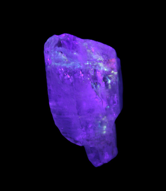 Fenster Crystal with hydrocarbons 34mm 11.6g in UV light