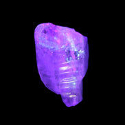 Fenster Crystal with hydrocarbons 34mm 11.6g in UV light