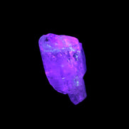 Fenster Crystal with hydrocarbons 34mm 11.6g in UV light