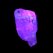 Fenster Crystal with hydrocarbons 34mm 11.6g in UV light
