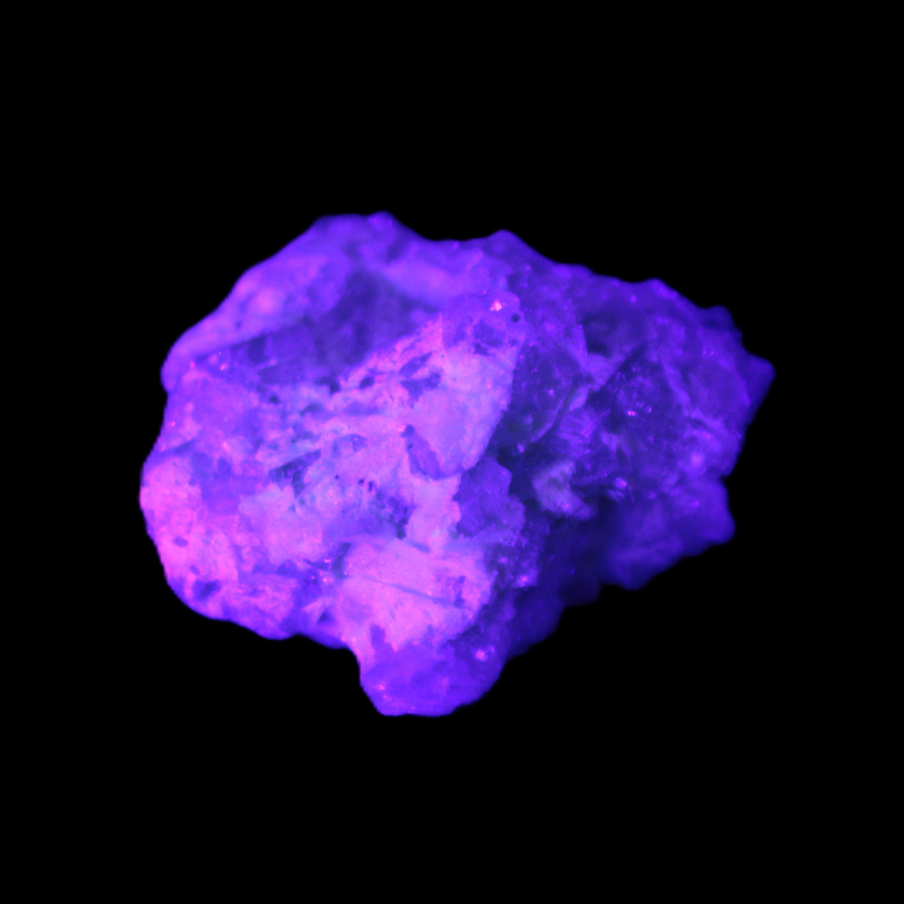 Green Tourmaline cluster from Afghanistan 54.5ct 10.9g in UV light - Rocks and Things Store