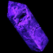 Sphalerite geode 24*89mm wand 94g in UV light - Rocks and Things Store
